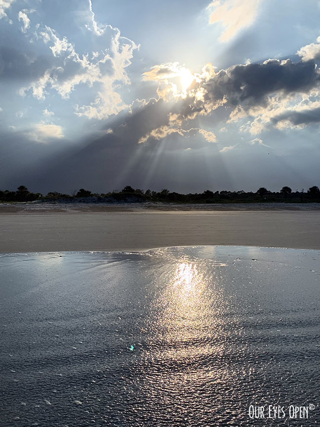 Sunset on Little Talbot Island State Park taken from the surf just before a storm moved in.