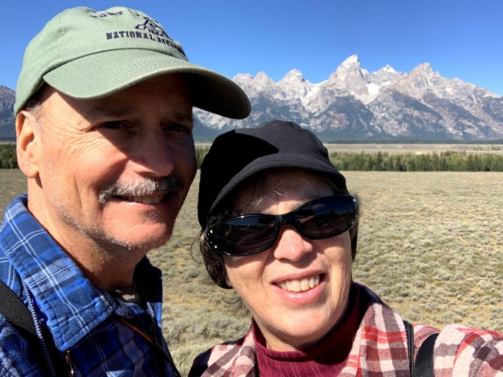 Frank and Lisa selfie with the beautiful Grand Teton Mountain Range in the background.