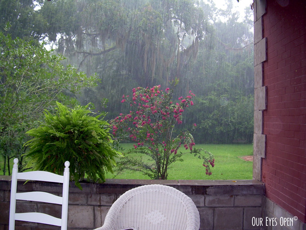 Rain shower while sitting on a covered porch of a bed & breakfast in Micanopy, FL.