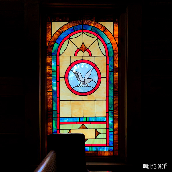 Stained glass window in the small church at the Mountain Top Inn & Resort, Warm Springs, Georgia.